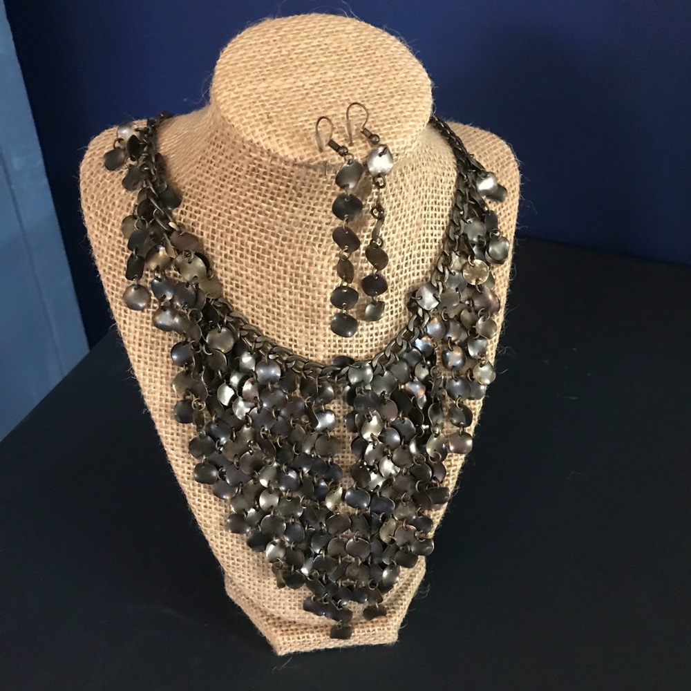 Bib style statement necklace and earring set.